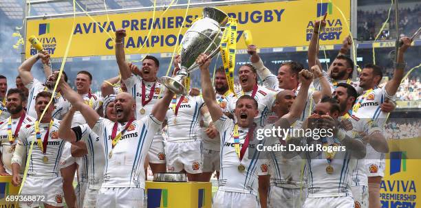 Gareth Steenson and Jack Yeandle of Exeter Chiefs raise the Premiership trophy after their victory during the Aviva Premiership match between Wasps...