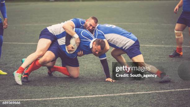 rugby players training hard - work hard play hard stock pictures, royalty-free photos & images