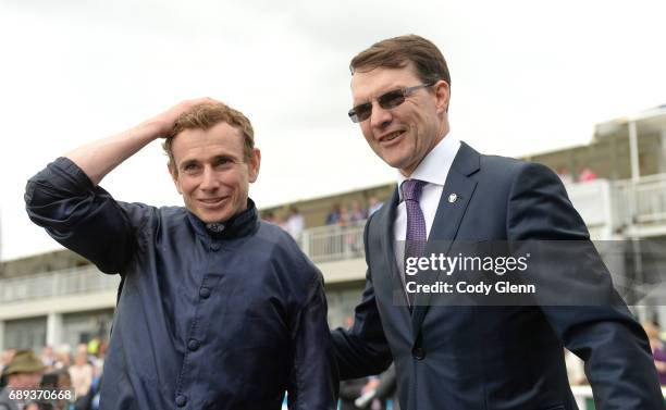 Kildare , Ireland - 28 May 2017; Jockey Ryan Moore with trainer Aidan O'Brien after winning Tattersalls Irish 1,000 Guineas on Winter at Tattersalls...