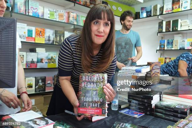 Dolores Redondo signs books during the book fair in Madrid held from May 26 to July 11, 2017 in Retiro Park in Madrid. Spain. May 28, 2017