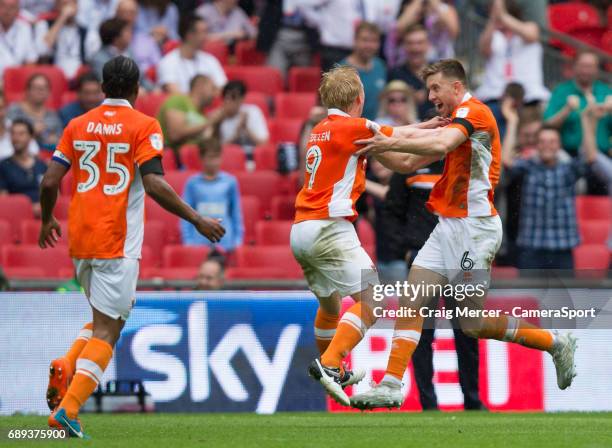 Blackpool's Mark Cullen celebrates scoring his sides second goal with team mate Will Aimson during the EFL Sky Bet League Two Play-Off Final match...