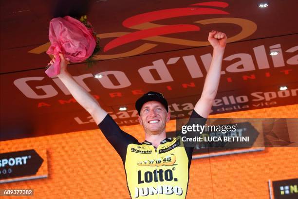 Netherlands' Jos van Emden of team Lotto NL-Jumbo celebrates on the podium after winning the Individual time-trial between Monza and Milan on the...