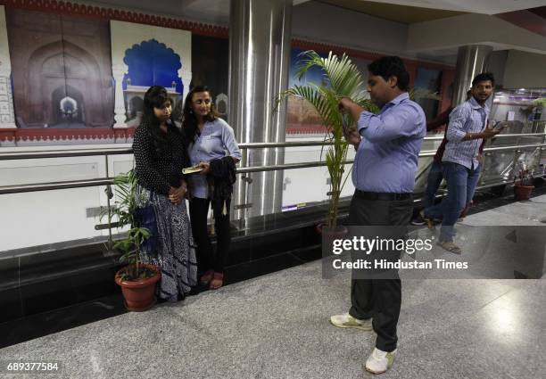 People enjoying first metro ride at ITO to Kashmere Gate section, after Union Minister of Urban Development M. Venkaiah Naidu, and Chief Minister of...