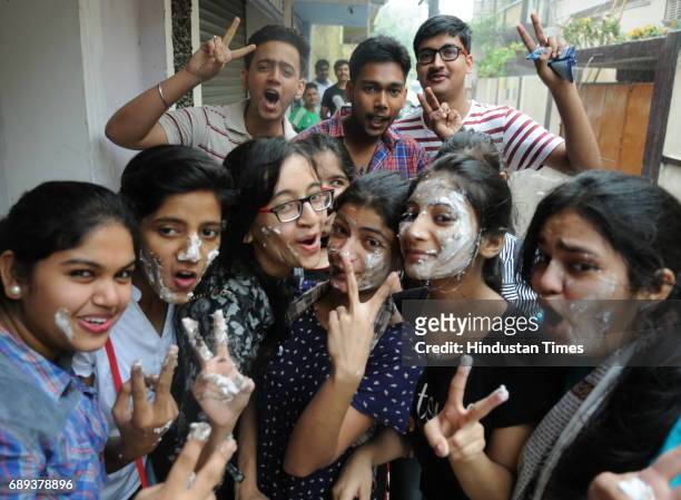 Students celebrate after the class 12th CBSE result announced, on May 28, 2017 in Patna, India. A total of 19 397 students from Classes 10 and 12...
