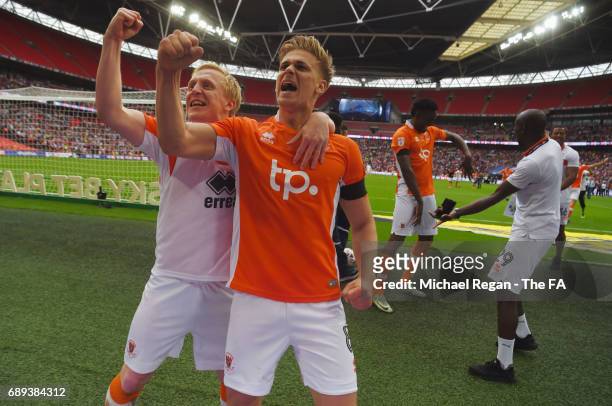 Goalscorers Mark Cullen and Brad Potts of Blackpool celebrate victory and promotion after the Sky Bet League Two Playoff Final between Blackpool and...