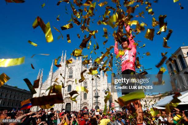 The winner of the 100th Giro d'Italia, Tour of Italy cycling race, Netherlands' Tom Dumoulin of team Sunweb holds the trophy on the podium near...