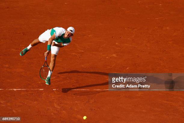 Lucas Pouille of France plays a forehand during the mens singles first round match against Julien Benneteau of France on day one of the 2017 French...