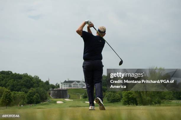 Colin Montgomerie of Scotland hits his tee shot on the first tee during Final Round for the 78th KitchenAid Senior PGA Championship at Trump National...