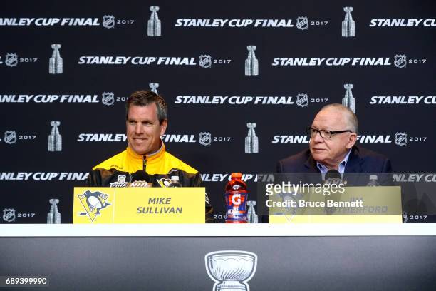 Coach Mike Sullivan and General Manager Jim Rutherford of the Pittsburgh Penguins answer questions in a press conference during Media Day for the...