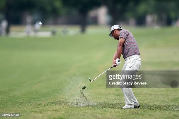 Yuta Ikeda of Japan plays his second shot on the 11th hole during the Final Round of the DEAN & DELUCA Invitational on May 28, 2017 in Fort Worth,...