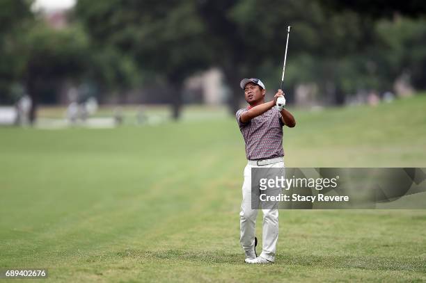 Yuta Ikeda of Japan plays his second shot on the 11th hole during the Final Round of the DEAN & DELUCA Invitational on May 28, 2017 in Fort Worth,...