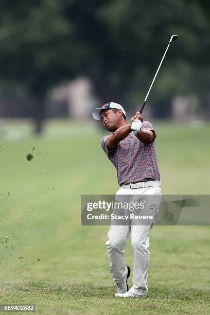 Yuta Ikeda of Japan plays his second shot on the 11th hole during the Final Round of the DEAN & DELUCA Invitational on May 28, 2017 in Fort Worth,...