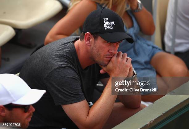 Leon Smith Coach of the British Davis cup team watches on during the mens singles first round match between Daniel Evans of Great Britain and Tommy...