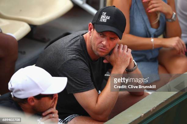 Leon Smith Coach of the British Davis cup team watches on during the mens singles first round match between Daniel Evans of Great Britain and Tommy...