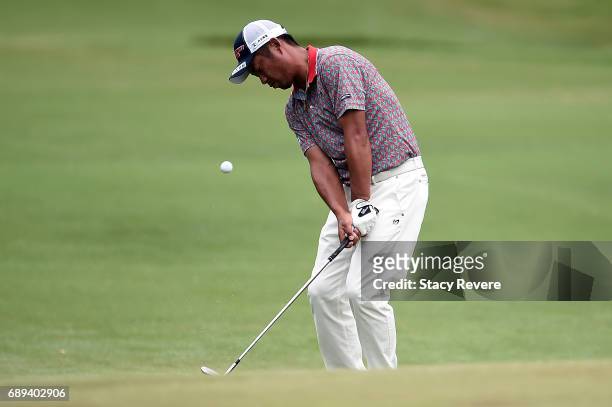 Yuta Ikeda of Japan plays a chip shot onto the 11th green during the Final Round of the DEAN & DELUCA Invitational on May 28, 2017 in Fort Worth,...