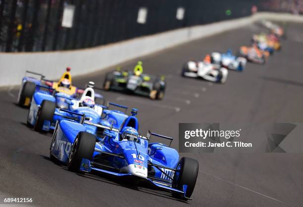 Tony Kanaan of Brazil, driver of the NTT Data Honda, in action during the 101st running of the Indianapolis 500 at Indianapolis Motorspeedway on May...