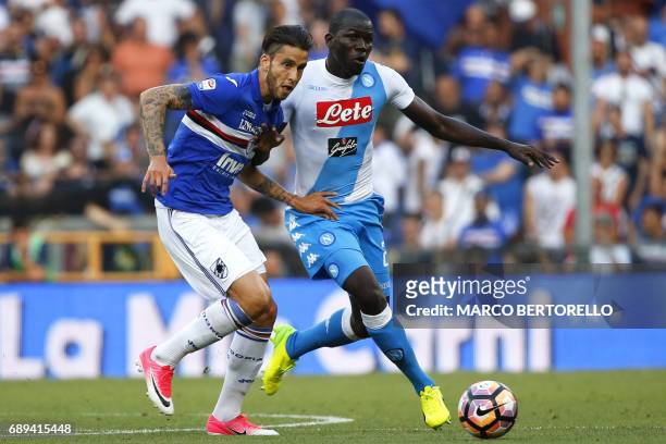 Sampdoria's midfielder Ricardo Gabriel Alvarez from Argentina fights for the ball with Napoli's defender Kalidou Koulibaly from France during the...