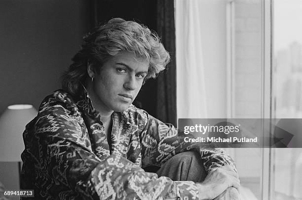 British singer-songwriter George Michael, of Wham!, in a Sydney hotel room during the pop duo's 1985 world tour, January 1985. 'The Big Tour' took in...