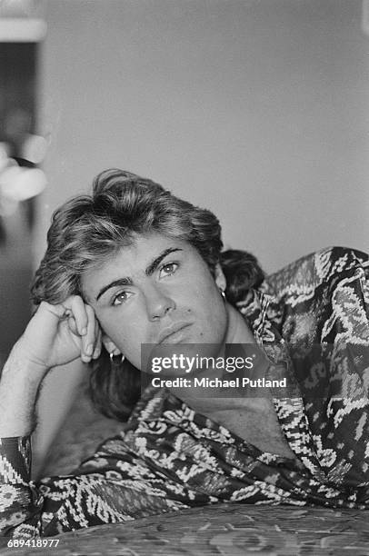 British singer-songwriter George Michael, of Wham!, in a Sydney hotel room during the pop duo's 1985 world tour, January 1985. 'The Big Tour' took in...