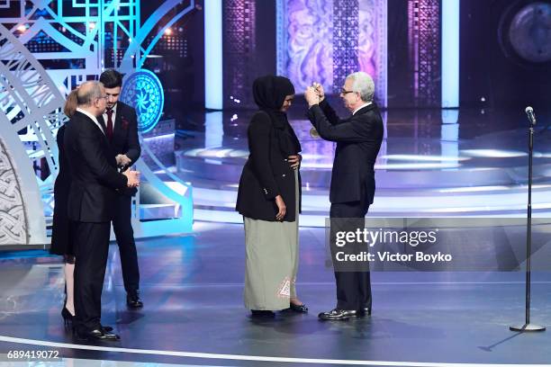 Aurora Prize Finalist Fartuun Adan receives a finalists medal presented by Aurora Prize Selection Committee Member Ernesto Zedillo during the 2017...