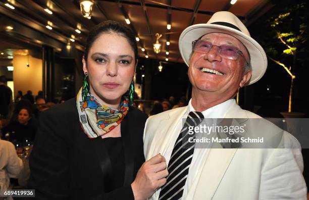 Carmen Kreutzer and Louie Austen pose during the 'Die Allee zum Genuss' restaurant opening party on May 24, 2017 in Vienna, Austria. On May 24, 2017...