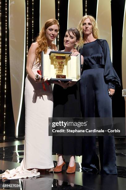 Leonor Serraille poses with the Camera d'Or won for the movie "Jeune Femme", President of the Camera d'Or jury Sandrine Kiberlain and actress...