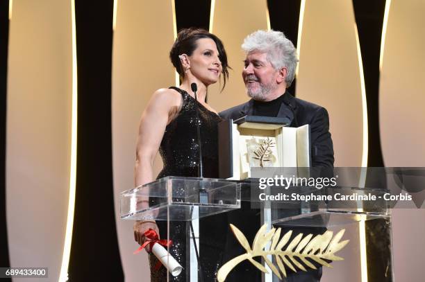 Juliette Binoche and President of the jury Pedro Almodovar are seen om the stage during the Closing Ceremony during the 70th annual Cannes Film...