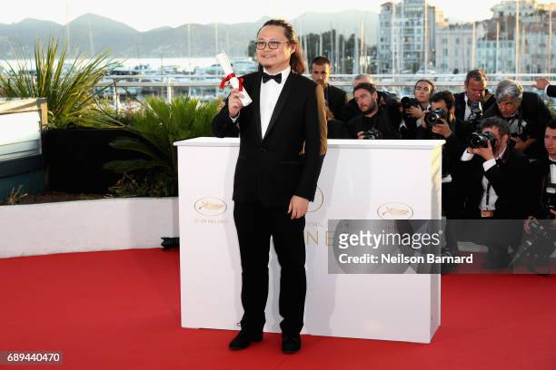 Director Qiu Yang, who won the award for Best Short Film for "A Gentle Night" , attends the Palme D'Or Winner Photocall during the 70th annual Cannes...