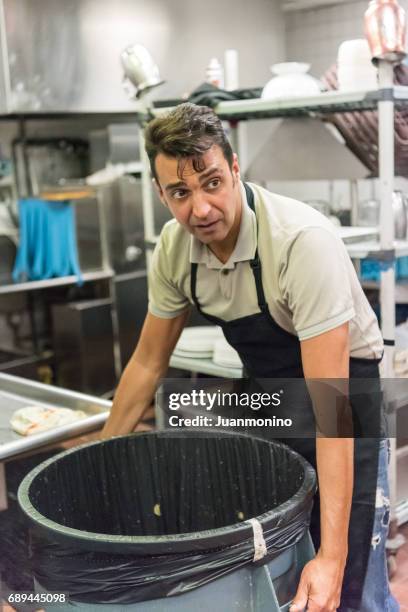 restaurant kitchen worker - bin stock pictures, royalty-free photos & images