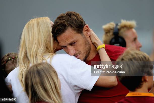 Francesco Totti of AS Roma cries after his last match with his wife Ilary Blasi after the Serie A match between AS Roma and Genoa CFC at Stadio...