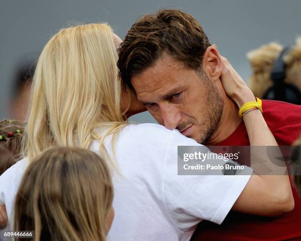 Francesco Totti of AS Roma cries after his last match with his wife Ilary Blasi after the Serie A match between AS Roma and Genoa CFC at Stadio...