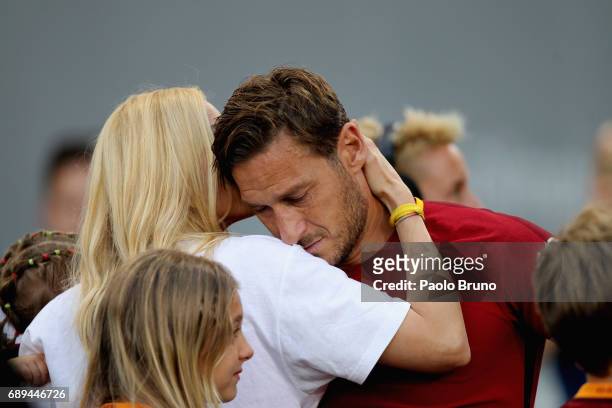 Francesco Totti of AS Roma cries after his last match with his wife Ilary Blasi after the Serie A match between AS Roma and Genoa CFC at Stadio...