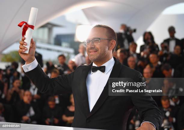 Andrey Zvyagintsev winner of the Prix Du Jury for the movie "Loveless" attends the Palme D'Or winner photocall during the 70th annual Cannes Film...