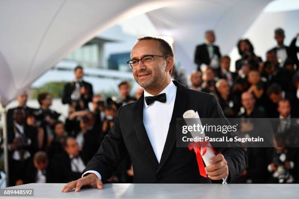 Andrey Zvyagintsev winner of the Prix Du Jury for the movie "Loveless" attends the Palme D'Or winner photocall during the 70th annual Cannes Film...