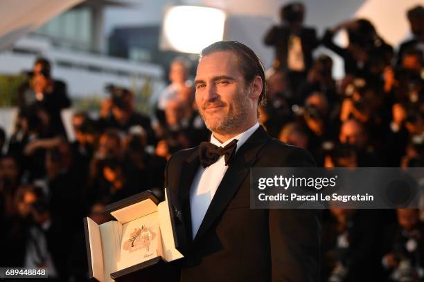 Actor Joaquin Phoenix, who won the award for Best Actor for his part in the movie "You Were Never Really Here", attends the Palme D'Or winner...