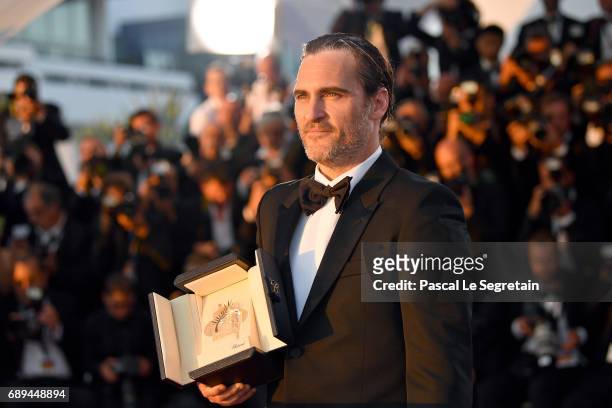 Actor Joaquin Phoenix, who won the award for Best Actor for his part in the movie "You Were Never Really Here", attends the Palme D'Or winner...