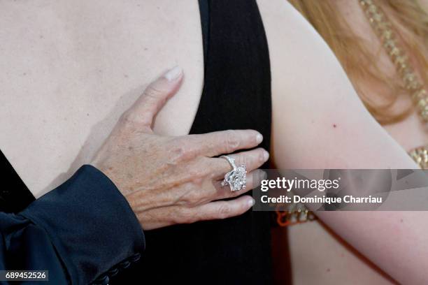 President of the Camera d'Or jury Sandrine Kiberlain, ring detail, attends the photocall during the 70th annual Cannes Film Festival at Palais des...