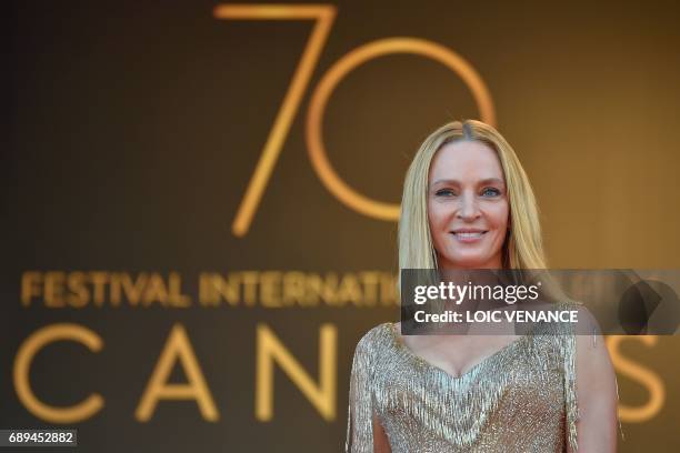 Actress and President of the Un Certain Regard jury Uma Thurman poses as she arrives on May 28, 2017 for the closing ceremony of the 70th edition of...