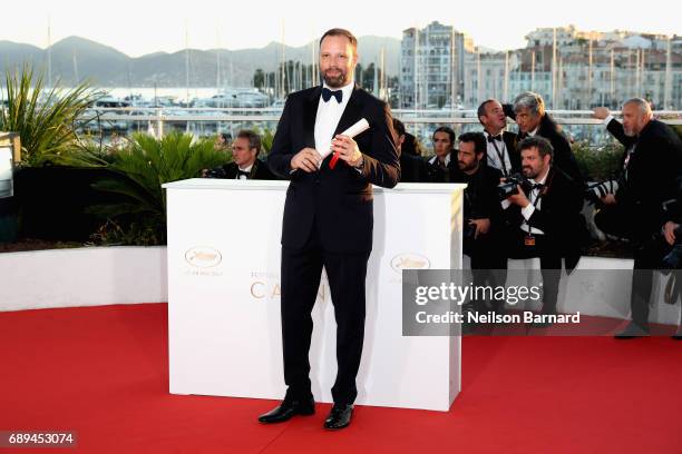 Yorgos Lanthimos winner of the award for Best Screenplay for the movie 'The Killing of a Sacred Deer' attends the Palme D'Or Winner Photocall during...