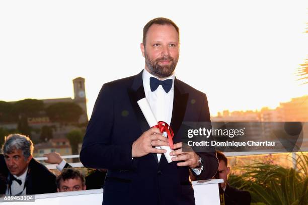 Yorgos Lanthimos winner of the award for Best Screenplay for the movie "The Killing of a Sacred Deer" attends the Palme D'Or winner photocall during...