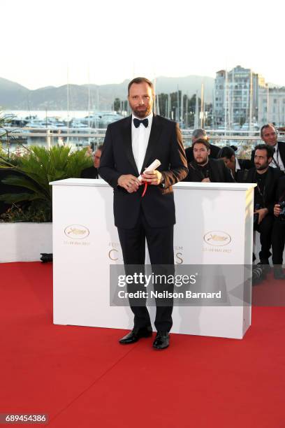 Yorgos Lanthimos winner of the award for Best Screenplay for the movie 'The Killing of a Sacred Deer' attends the Palme D'Or Winner Photocall during...