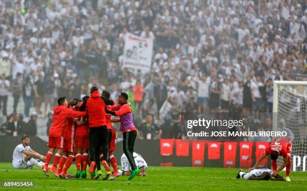 Benfica players celebrate after winning the Portugal's Cup final football match SL Benfica vs Vitoria SC at Jamor stadium in Oeiras, outskirts of...