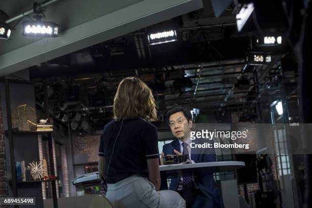 Kai-fu Lee, founder and chief executive officer of Sinovation Ventures, speaks during a Bloomberg Technology interview in San Francisco, California,...