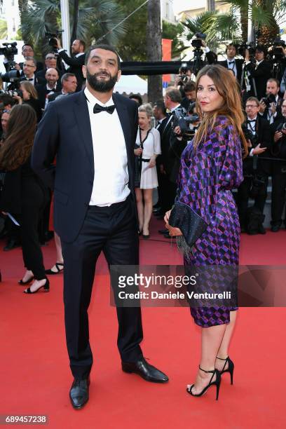 Ramzy Bedia and a guest attend the Closing Ceremony during the 70th annual Cannes Film Festival at Palais des Festivals on May 28, 2017 in Cannes,...