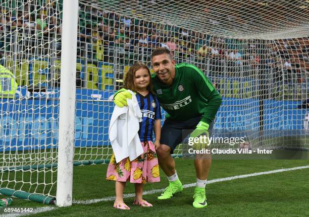 Juan Pablo Carrizo of FC Internazionale and his daughter pose during the Serie A match between FC Internazionale and Udinese Calcio at Stadio...