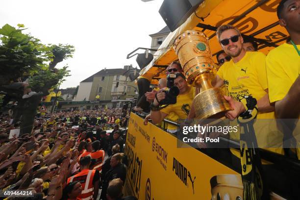 Marcel Schmelzer of Borussia Dortmund greets fans as the team celebrates during a winner's parade at Borsigplatz on May 28, 2017 in Dortmund, Germany.