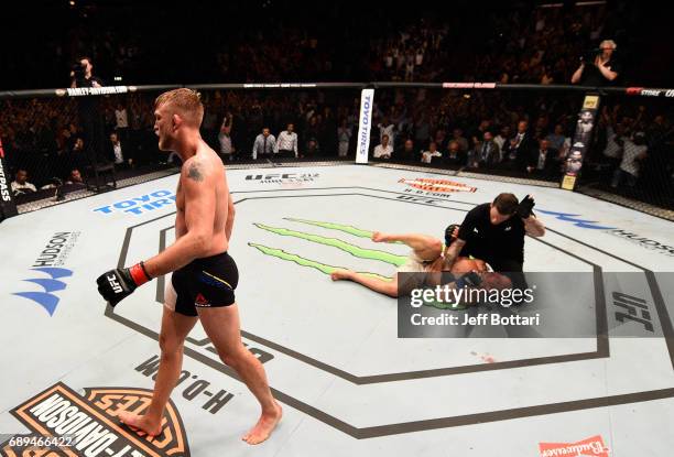 Alexander Gustafsson celebrates his knockout victory over Glover Teixeira in their light heavyweight fight during the UFC Fight Night event at the...