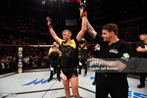 Alexander Gustafsson celebrates his knockout victory over Glover Teixeira in their light heavyweight fight during the UFC Fight Night event at the...