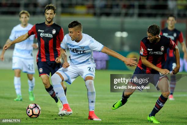 Sergej Milinkovic Savic of SS Lazio compete for the ball with Mario Sampirisi of FC Crotone during the Serie A match between FC Crotone and SS Lazio...