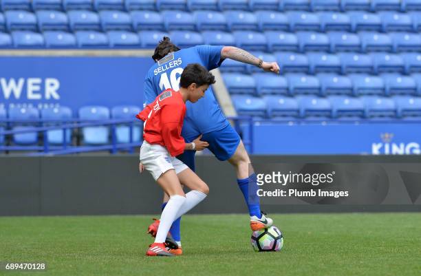 May 28: Junior Andre in action Thomas Sellers during the Celebrity Charity Football Match at King Power Stadium on May 28 , 2017 in Leicester, United...
